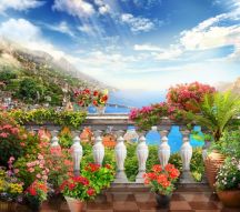 Фотообои Балкон в цветах у моря